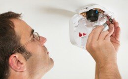 Changing the batteries in a smoke detector 